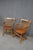 Pair of L. & J.G. Stickley solid cherry Windsor armchairs in the traditional American style. Each chair features a tall...