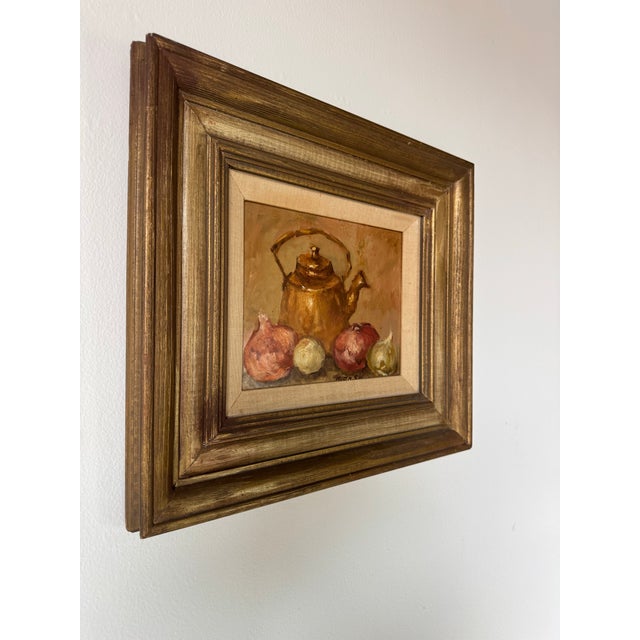 Charming 1970’s vintage still life oil painting by artist Manso, depicting a warm and intimate tabletop composition...