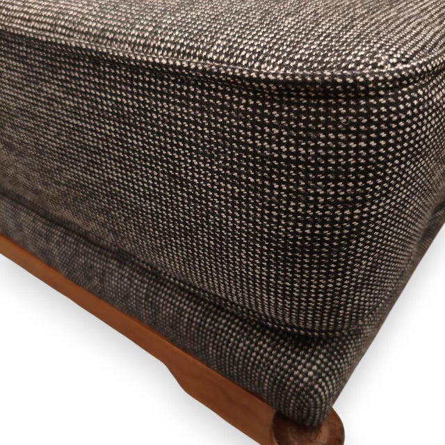 Mid-century style teak bench with tapered legs finished in brass. The upholstery is in fantastic condition, as is the wood...