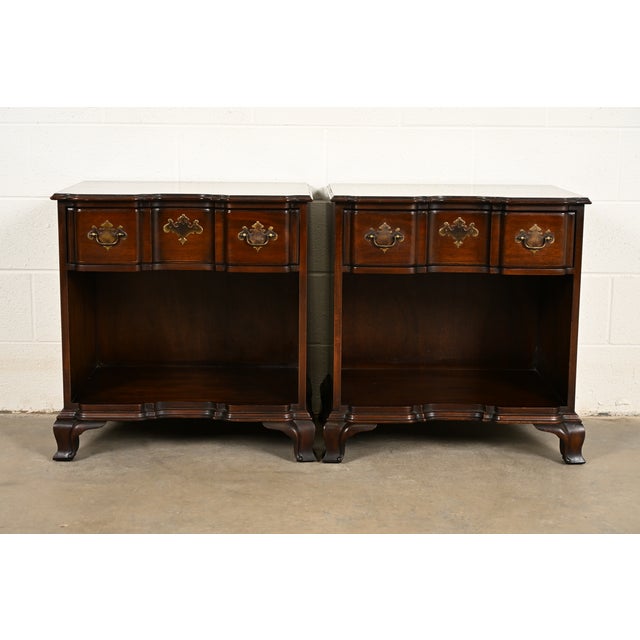 A gorgeous pair of Georgian or Chippendale style block front nightstands or end tables By Kindel Furniture USA, Circa...