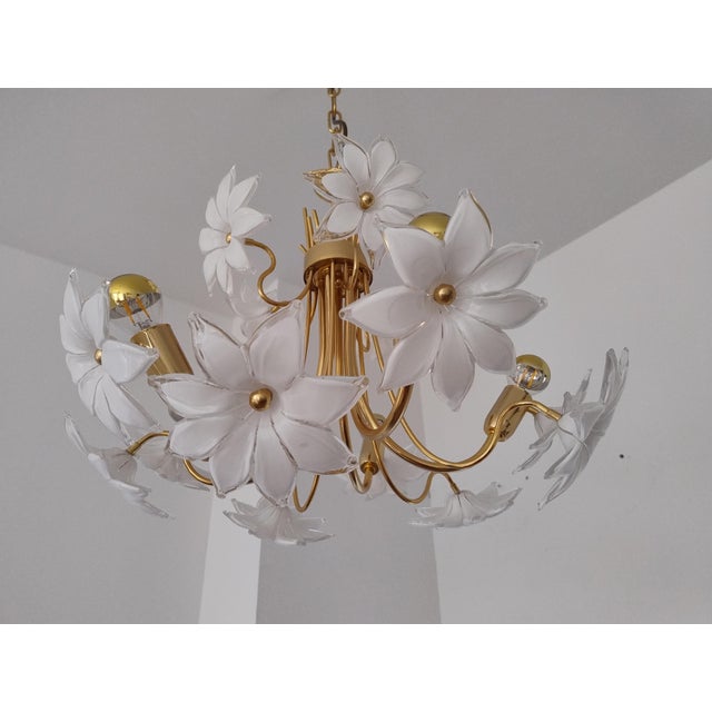Awesome, very rare murano glass chandelier with, white, tender glass flowers from the 1970s. Very heavy and high quality...