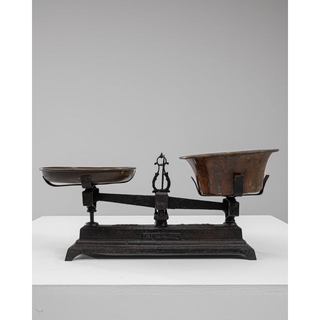 This 19th Century French iron scale features a bold, well-crafted silhouette that reflects the utilitarian elegance of...