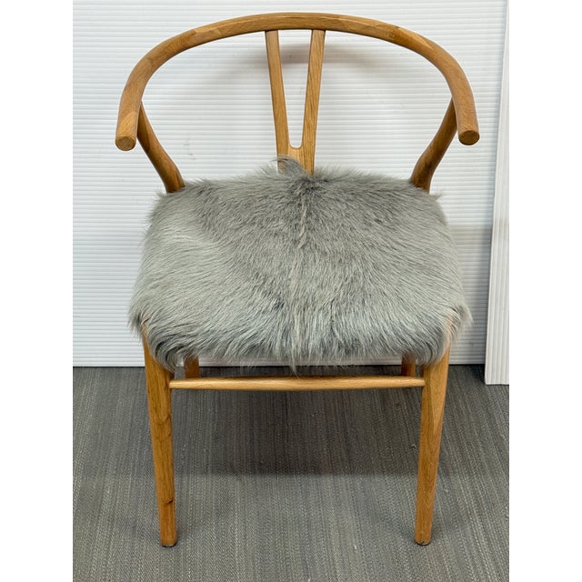 Design Plus Gallery presents the Kairo Goat Hide Wishbone Chair from HD Buttercup. This chair is a premium reproduction of...