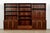 This impressive vintage Swedish mid-century modern three-section bookcase cabinet system was designed by Bertil Fridhagen...