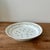Antique early 19th century English porcelain serving dish with hand-painted floral sprigs, green garland border, and gilt...