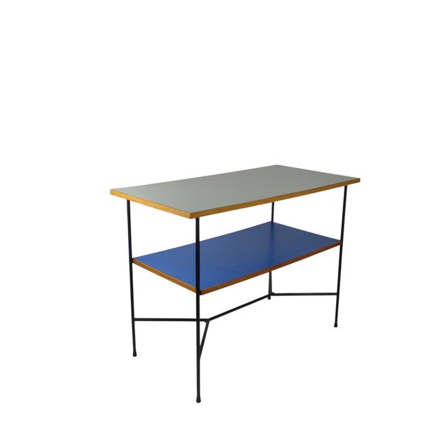 Formica Table att. Giulio Zappa Italy, 1950 Black enamel solid frame. The metal frame has as a very appealing line play....