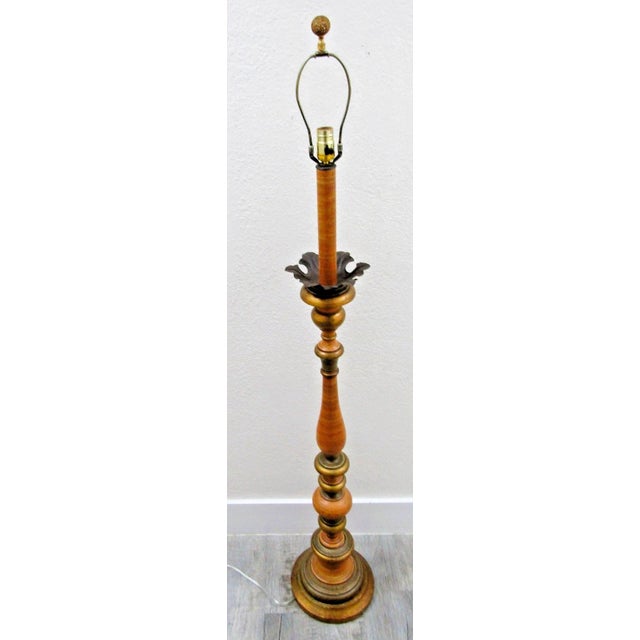 The Vintage Parcel-Gilt Wood Candlestick Floor Lamp with Acanthus Leaf Accent is a large, corded electric lamp from the...