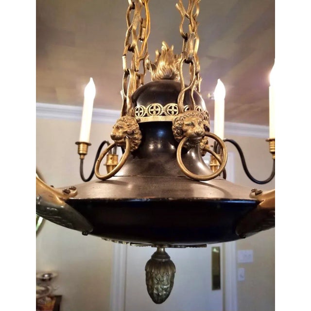 This vintage chandelier is truly a work of art. In the style of Charles X or Baroque period, it features four chains with...