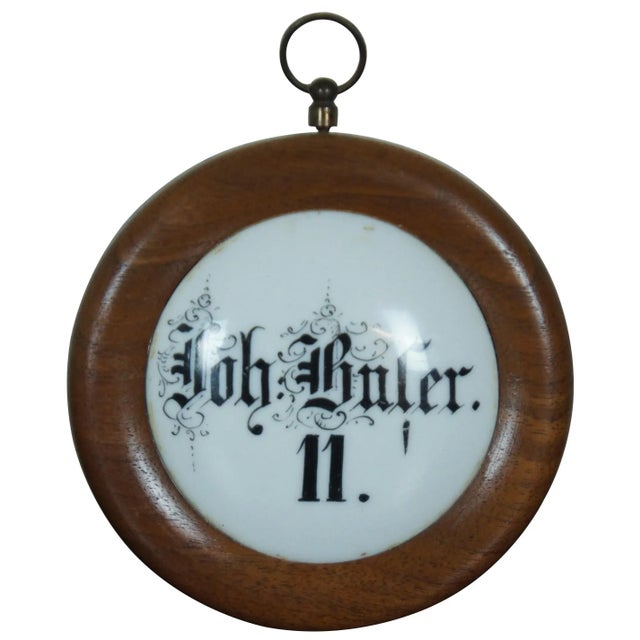 Two rare miniature wood framed antique German porcelain wall plaque signs, one in black with a design of grapes, leaves...