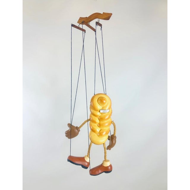 The manufacturer is unknown. However it is known, that the puppet was used to advertise the Eckerhard Raschke bakery from...