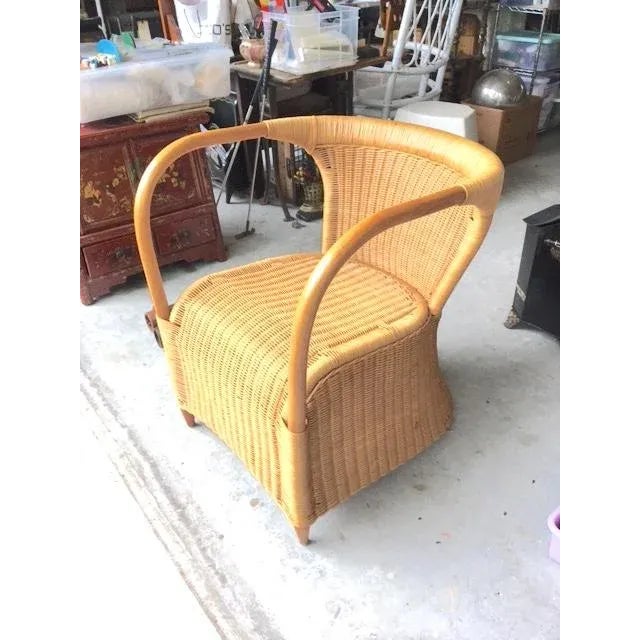 Great rattan chair in pristine condition. It's comfortable too! Very sturdy chair with a tight weave. Has fluid lines all...