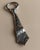 This vintage silver-plated bottle opener from 1980s Italy is crafted in the playful shape of a tie, featuring an elegant...