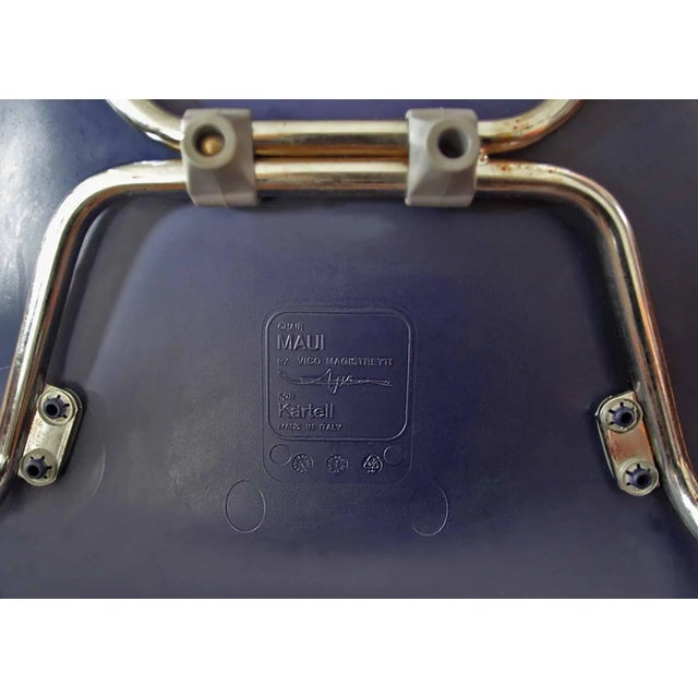 Pair of vintage navy blue molded plastic 'Maui' chairs with chrome legs and original feet. By Kartell, Italy. Chairs stack...