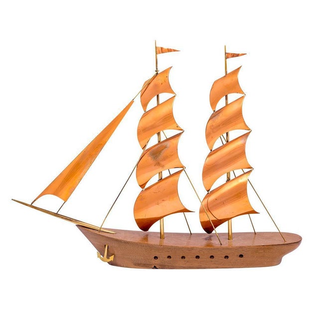 Sailing boat with two masts designed and executed by werkstatte hagenauer wien, vienna. Copper sails, brass anchor and...