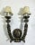 An exceptional Neo Gothic large size wall scone. The wall sconce has two large arms, each arm ending in a candelabra light...