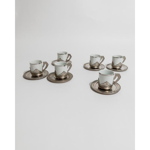 Elegant 12-piece vintage espresso set from the 1960s, made in Monopoli, Italy. Includes 6 porcelain cups with silver-...