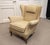 Elegant Danish wingback armchair designed by Ernst Kühn for Lysberg Hansen & Therp, Copenhagen, dating from the 1930s. The...
