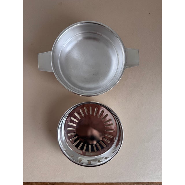 The perfect accompaniment to your table, this butter dish features useful handles and a draining system to keep butter...