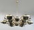 Italian modern chandelier with smoky Murano glass globes, mounted on solid brass frame in unlacquered natural brass finish...