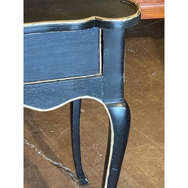 Pair of lovely French Provincial style side tables in black and gold. Creates an elegant look! Circa 1940 23w x 15d x 26h