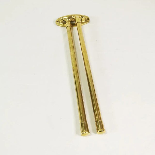 Wall hanger, origin Germany, 1930s It is characterized by the form of Art Deco. Made of thick brass. State; good-very...