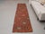 Vintage Hand-Knotted runner rug is a semi-antique vintage area rug. The '70s Eastern region of Anatolia's unique rug is...