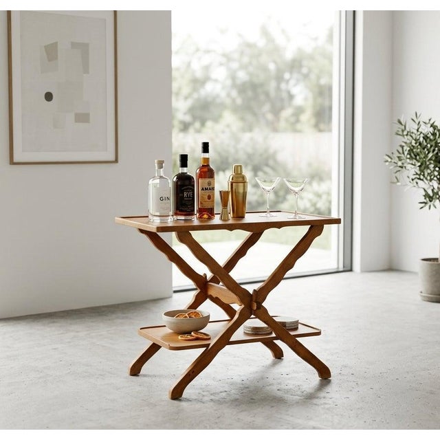 Elegant Danish serving table in solid oak, attributed to Henning Kjærnulf and produced in the 1960s during the Danish...