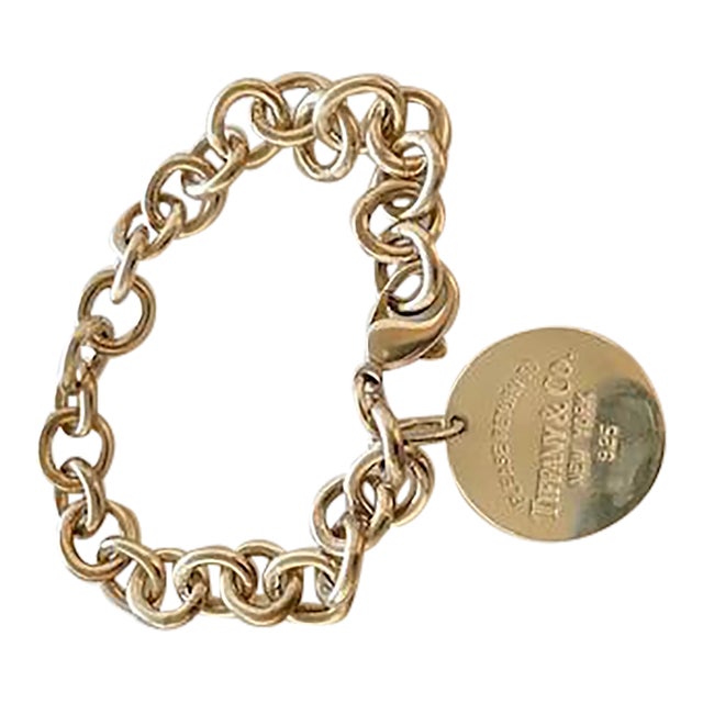 An original Tiffany & Co. round link bracelet from the iconic Return to Tiffany® collection, 925 sterling silver, 7" long...