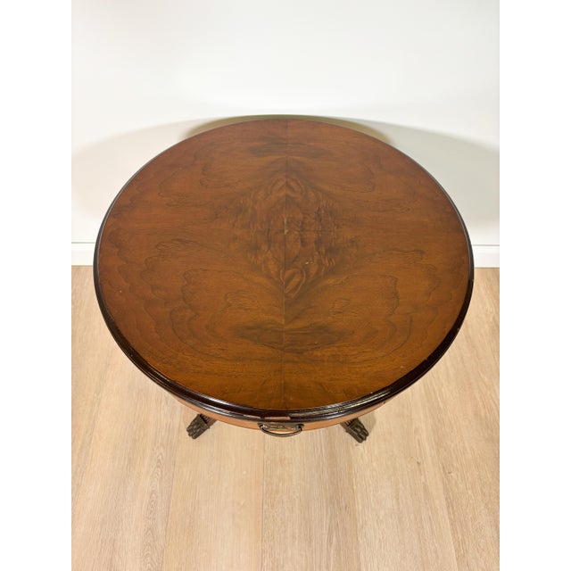 This beautiful vintage pedestal table by Williams and Sons, features a beautiful burl wood top wood finish with original...