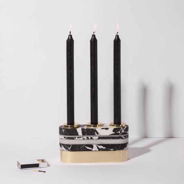 This block candleholder, first produced in 2018, is part of the STONELAND Collection and is made of Nero Antique and...