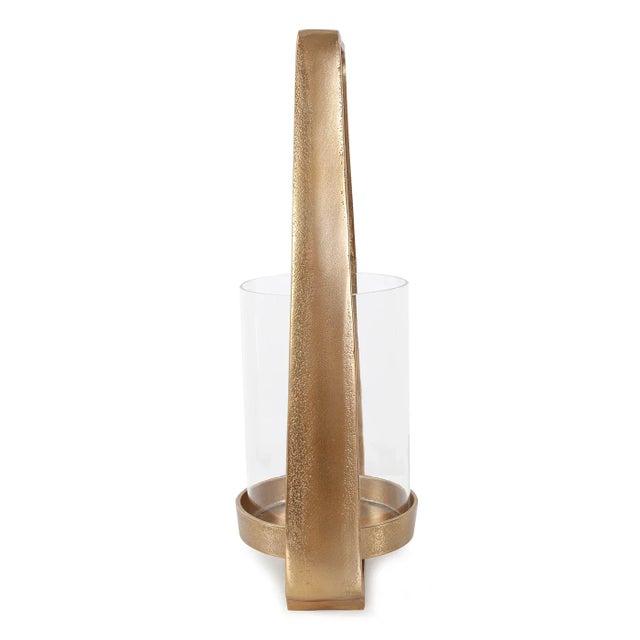 The Campton Gold Lantern This minimalist version of a classic vintage lantern was found an antique shop in Campton, New...