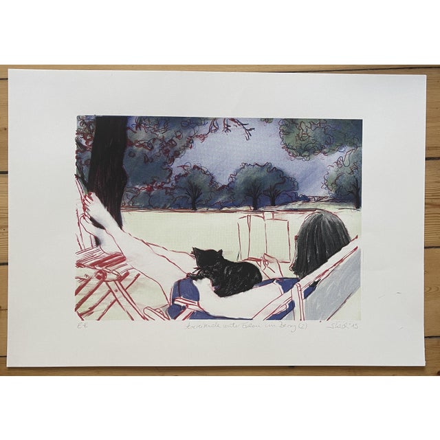 This playful screen print depicts a relaxed scene: A woman with dark hair engrossed in a book, sitting peacefully in the...