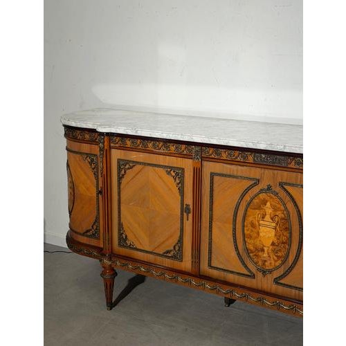 Exceptional large-scale sideboard by jp ehalt, crafted in elegant louis xvi style. This impressive piece stands out...
