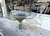 Pretty Italian Hollywood Regency style outdoor dining set from the 1960's. The set is made of heavy metal and includes two...