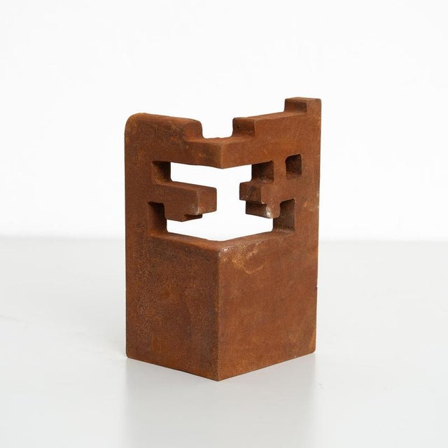 This exquisite abstract sculpture, crafted from iron, is a striking piece inspired by the bold and evocative works of...