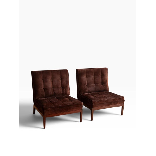 We are pleased to present this pair of George Smith "Norris" Slipper Chairs in Brown Suede. Elegant and simple silhouette....