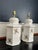 An elegant pair of antique European style porcelain table lamps, embodying the refined ease of English country and château...