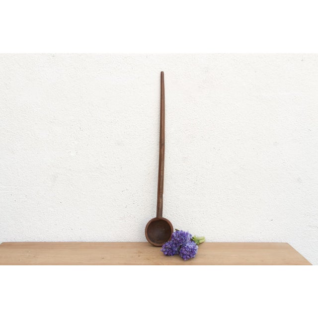 There is something deeply soulful about a simple wooden spoon—especially one carved by hand to feed a village. This...