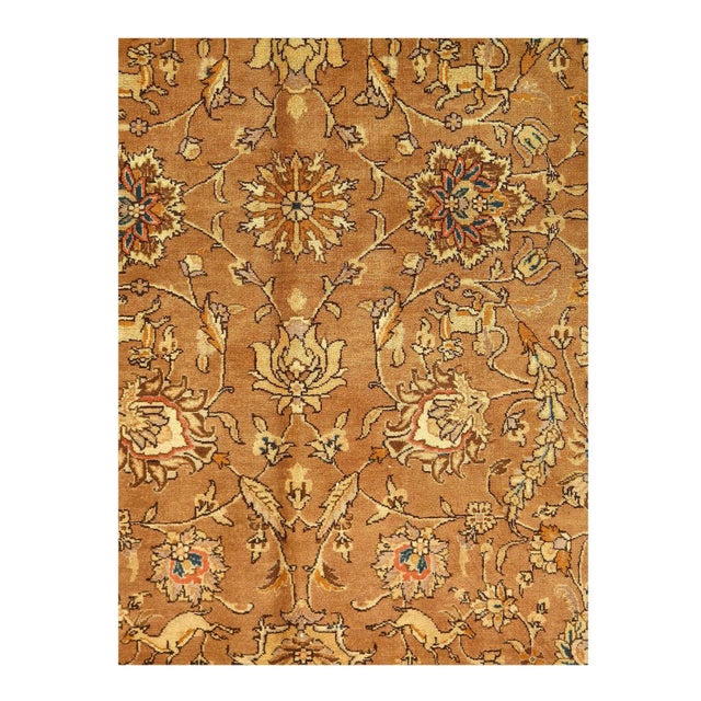 Vintage Tabriz is hand knotted in 100% lambs wool and is sure to bring elegance to any room setting. It has a pile making...
