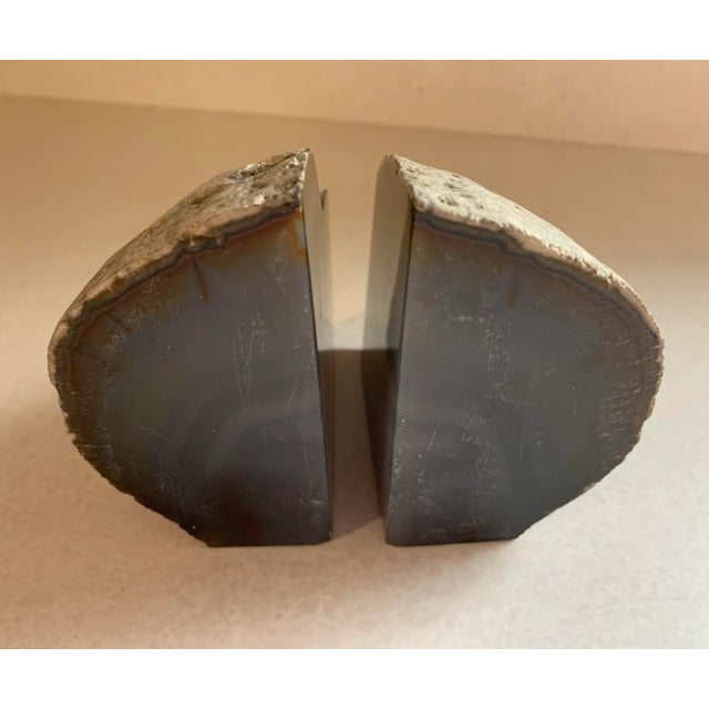Vintage natural form, Smokey blue, pair of geode bookends. Measure approximately 3.75”H x 4”D x 3”W.