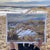 This gouache painting captures a serene landscape in Morrison, Colorado, where gentle hills meet distant mountains under a...