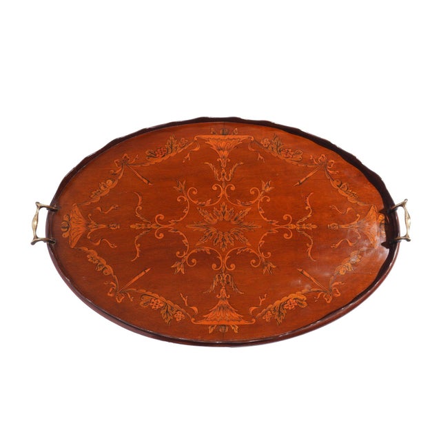 English mahogany oval serving tray with elaborate inlaid surface, scalloped gallery, and cast brass standing brass bail...