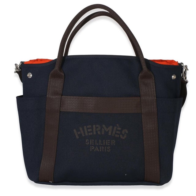 Item #: 154846 Interior Material: Fabric;Canvas MSRP: 3,225 Features Interior: One zip pocket. Two side slip pockets....