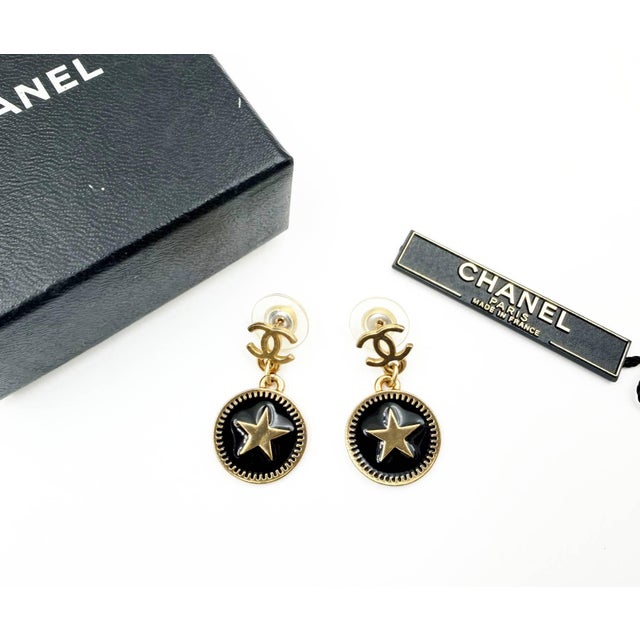 Chanel Vintage Gold Plated CC Star Round Black Coin Dangle Piercing Earrings *Marked 01 *Made in France *Comes with the...