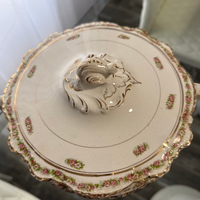This piece is a beautiful pink and gold flowered serving bowl dated October 1915 from Homer Laughlin. If you are a...