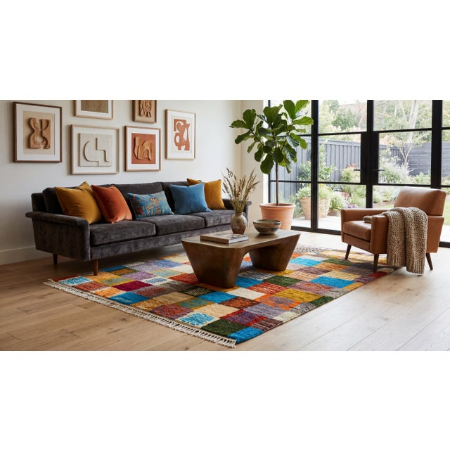 Elevate your space with this striking modern Baluch-style wool rug, a masterpiece of contemporary design rooted in tribal...