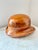 The mold consists of two removable parts — crown and brim — allowing hat makers to form the characteristic rounded...