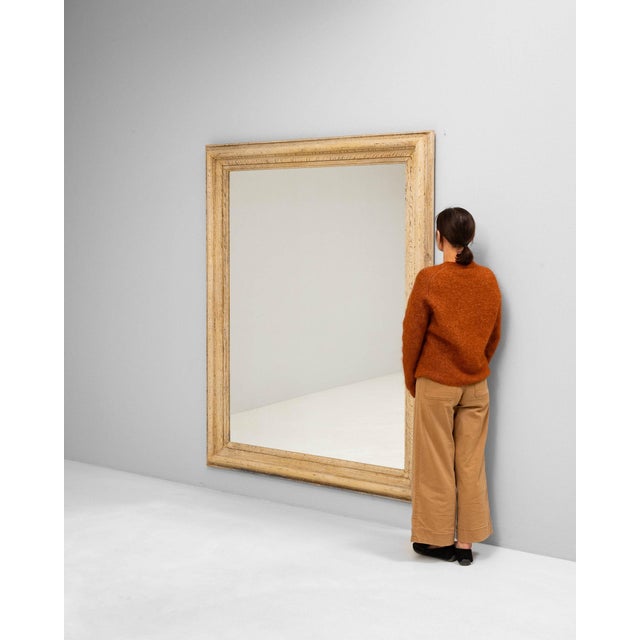 A mirror whose natural light oak frame, rectangular gives it real character at first glance. It was made in France during...