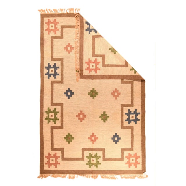 Ten eight point "Lesghi stars" in medium-dark blue and rust determine geometrically conforming straw border. The tabbed...