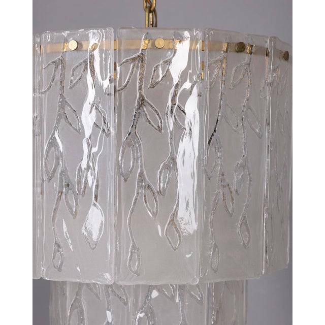 Chandelier with gilded metal structure and worked Murano glass plates, Italian design, 1960s. Up to 250V (Europe/UK...